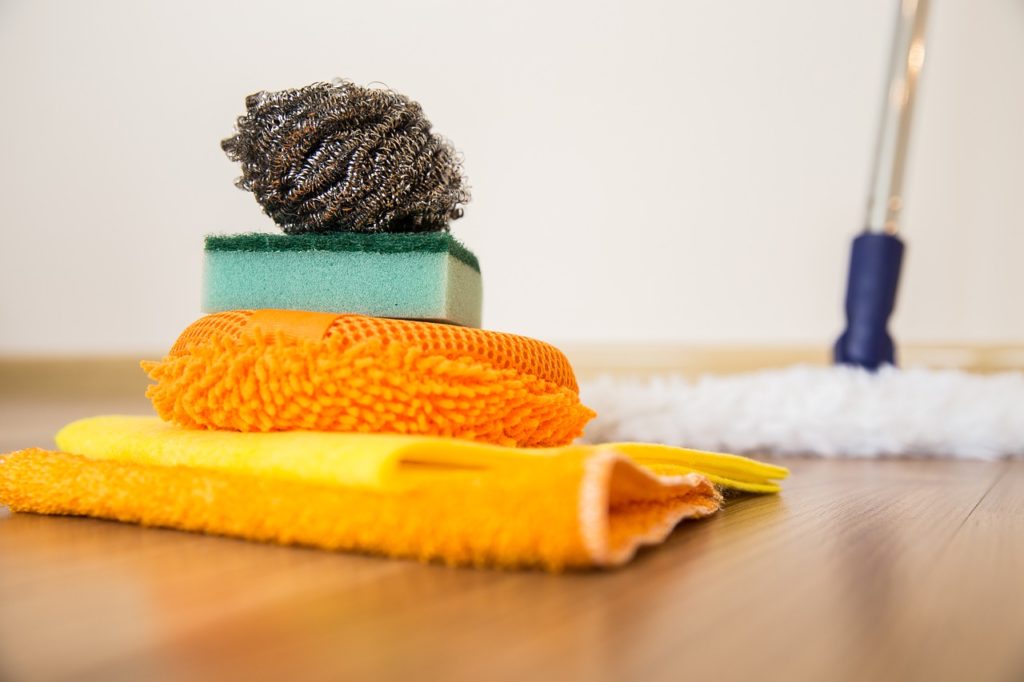 Mop, sponge, and rags used to for Spring Cleaning Tips