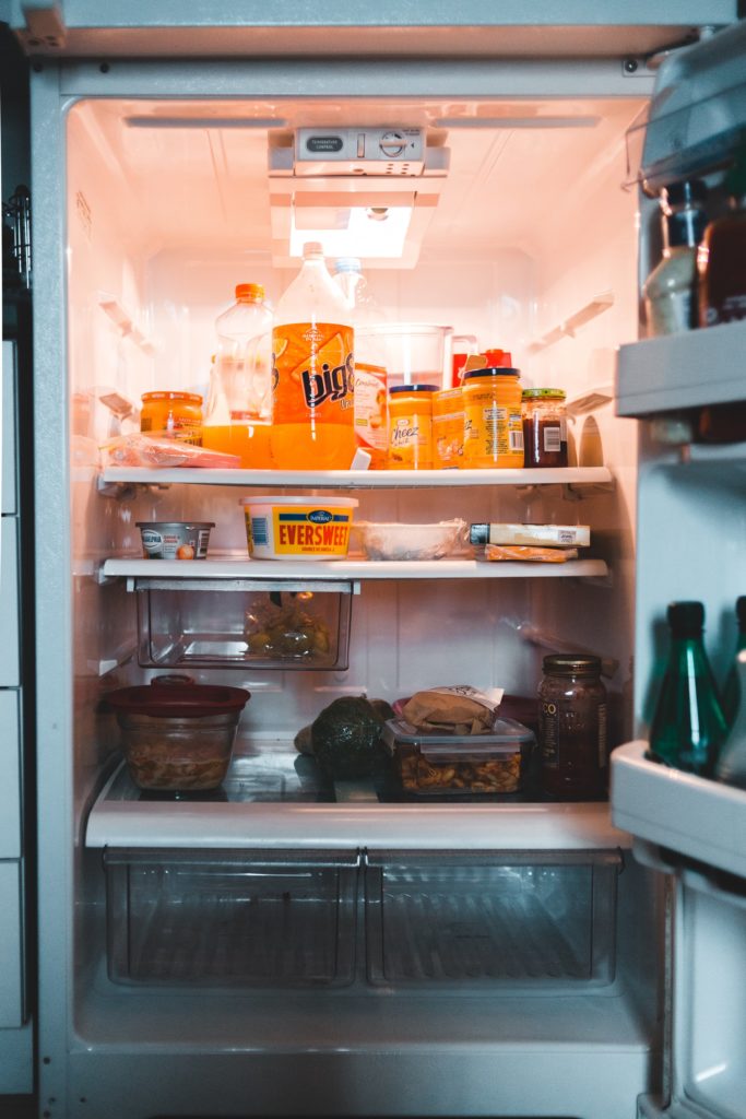 A refrigerator that needs to be cleans and organized by using refrigerator organization hacks