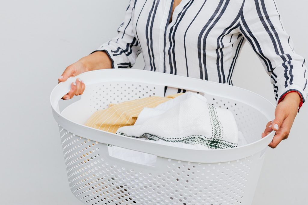 Moving hacks: Laundry basket full of clothes